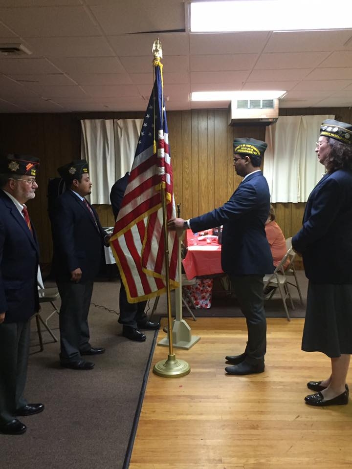 Incoming Post 754 Commander Gamalier Rosa in the process of being sworn in as Commander. 